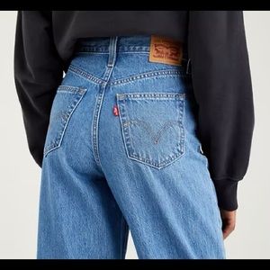 Levi’s high waisted light wash wide leg jeans.